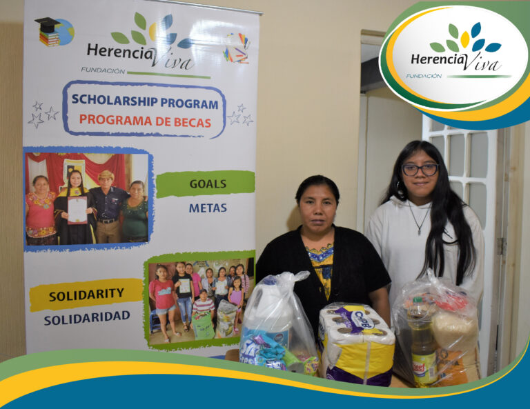 Providing bags of groceries to our scholarship students